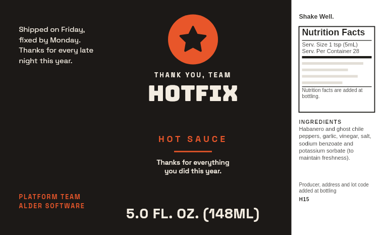 Team appreciation label “Hotfix” with a star medal on a very hot 5 oz garlic ghost pepper sauce bottle