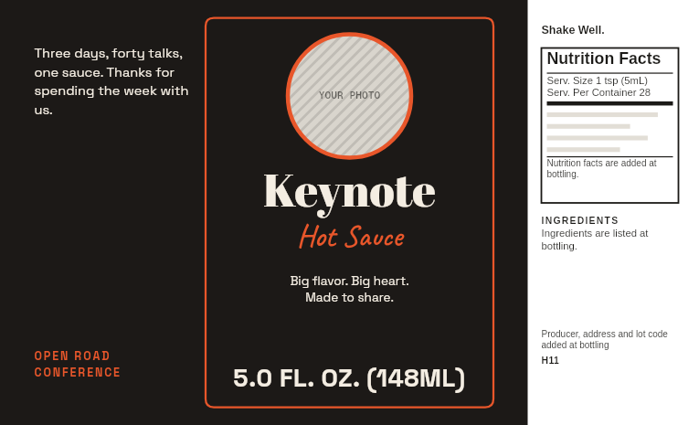 Conference label “Keynote” with a photo badge on a smoky 5 oz hot sauce bottle